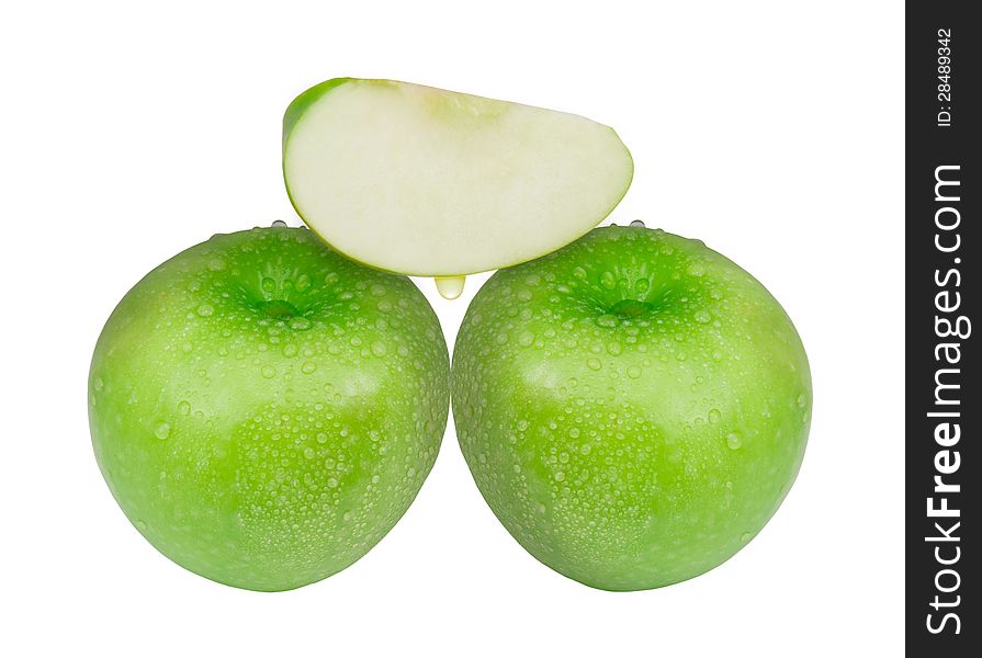 The cut green apple with drop