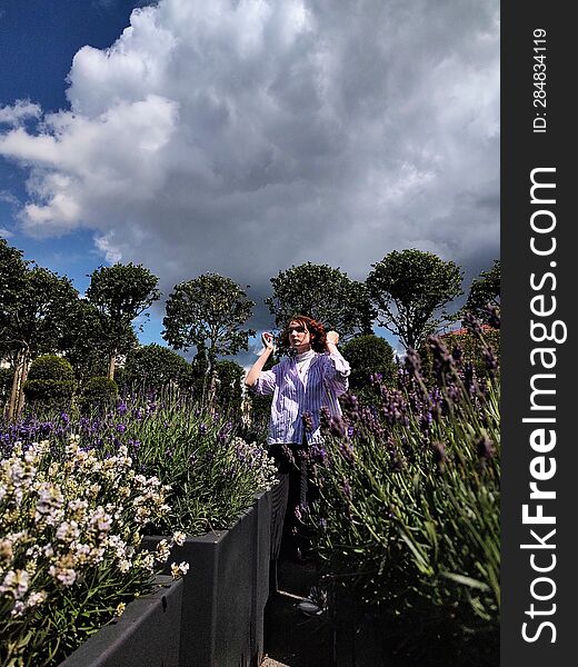 Girl Among Purple Lavender Bushes