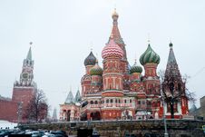 St Basil Temple And Spasskaya Tower Of Kremlin During Snowfall Stock Images St Basil Temple And Spasskaya Tower Of Kremlin During Snowfall Stock Images
