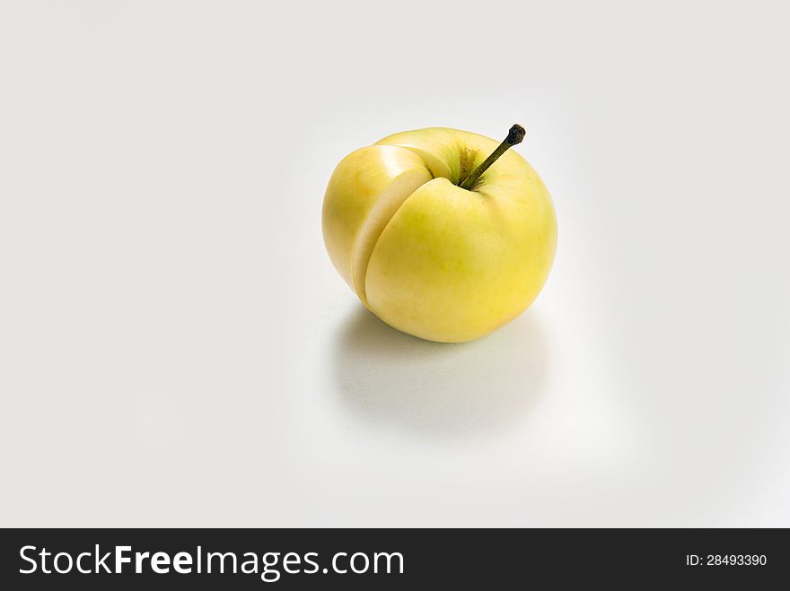 Golden apple on white background