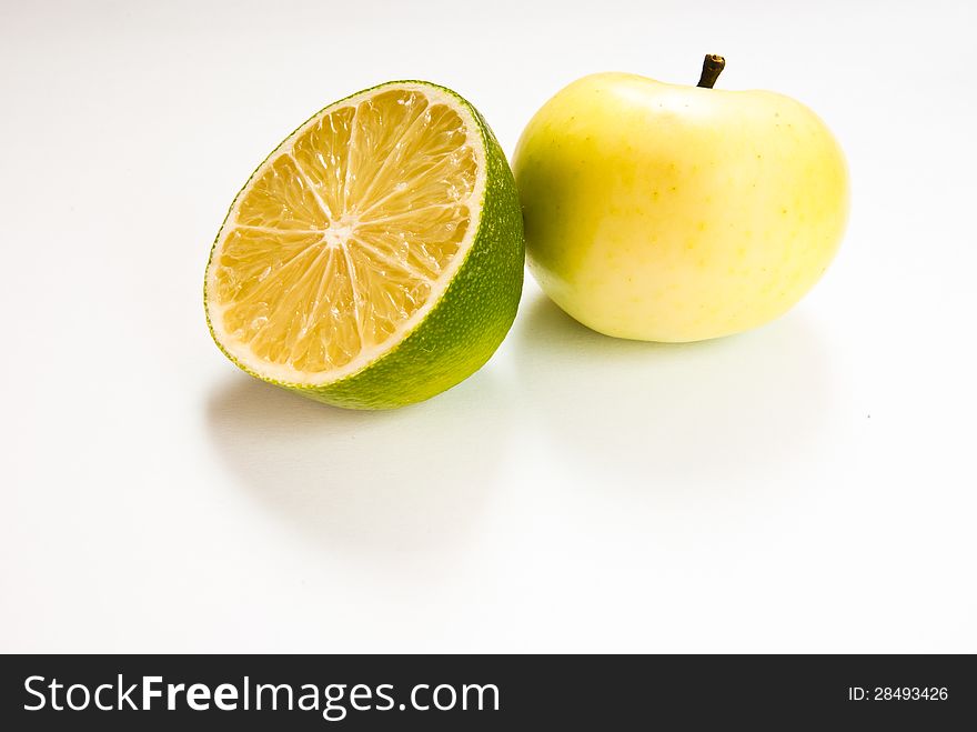 Lime & apple on white background