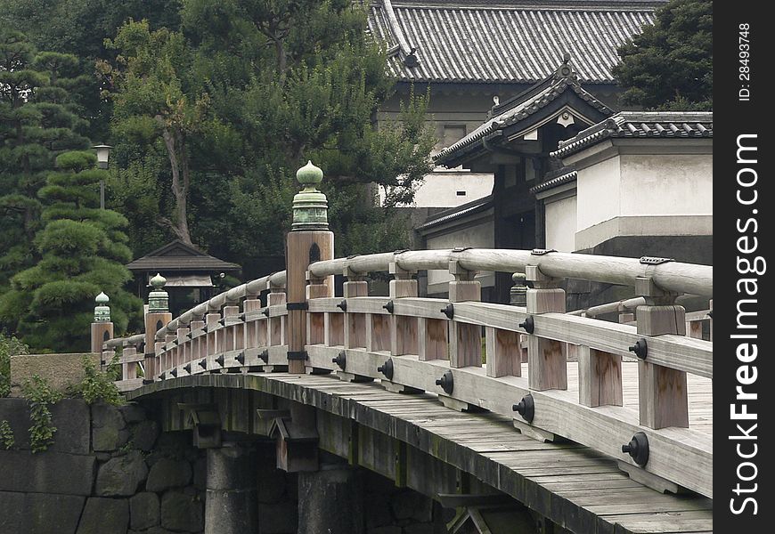 Traditional wooden bridge fragment from Imperial Palace in Tokyo. Traditional wooden bridge fragment from Imperial Palace in Tokyo