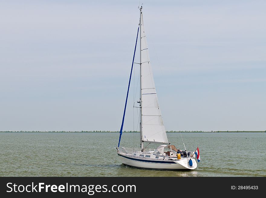 Sailboat in Marken lake, Netherlands