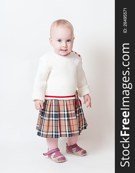 One year-old child in studio white background