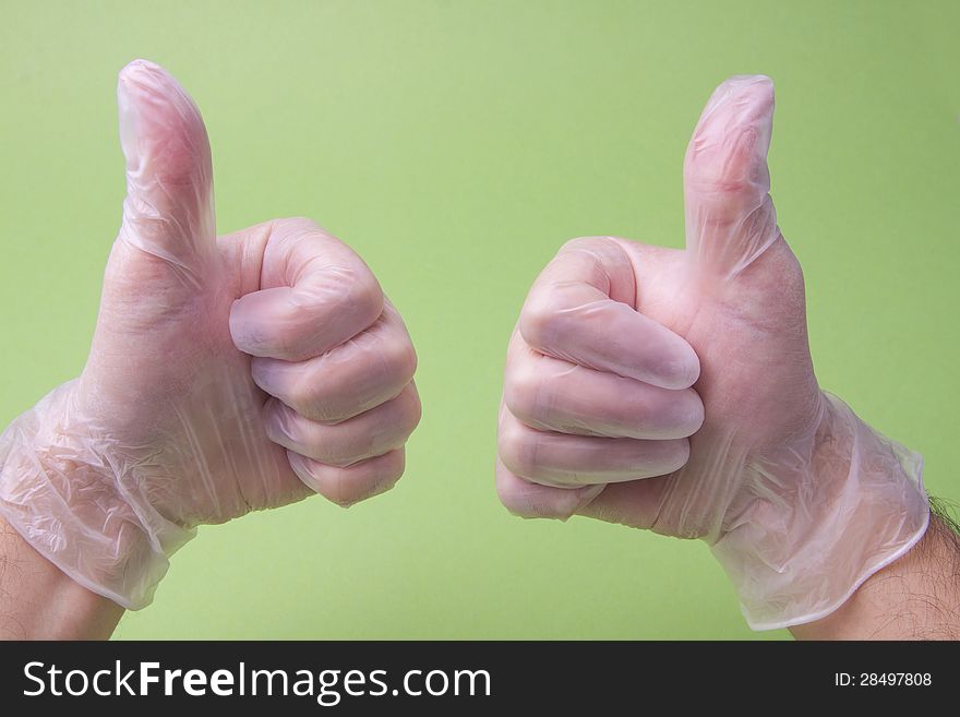 Doctor Showing Thumbs Up On Green Background