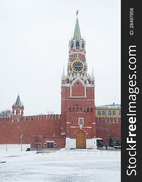 Spasskaya Tower of Kremlin in Moscow at wintertime during snowstorm, Russia. Spasskaya Tower of Kremlin in Moscow at wintertime during snowstorm, Russia