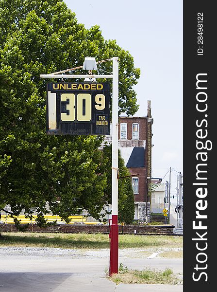 Service station sign showing the price of unleaded fuel in the 1990s. $1.30 per gallon of gas with tax of .09 cents. Service station sign showing the price of unleaded fuel in the 1990s. $1.30 per gallon of gas with tax of .09 cents.