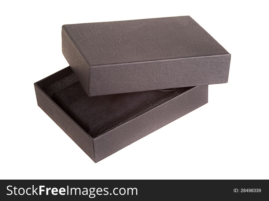 Close up of a opened black gift box on white background