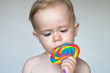 Toddler With Lollipop Stock Photos