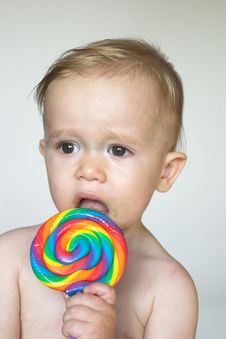 Toddler With Lollipop Stock Images