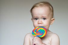 Toddler With Lollipop Stock Photo