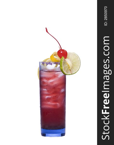 Colorful alcoholic cocktail in a tall glass against white background. Colorful alcoholic cocktail in a tall glass against white background