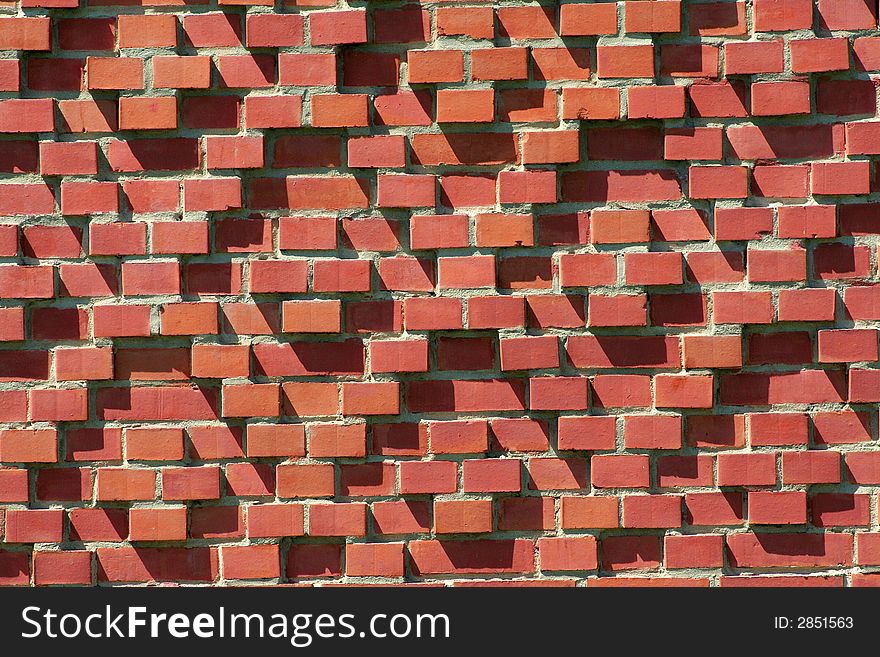 Red brick wall with pattern