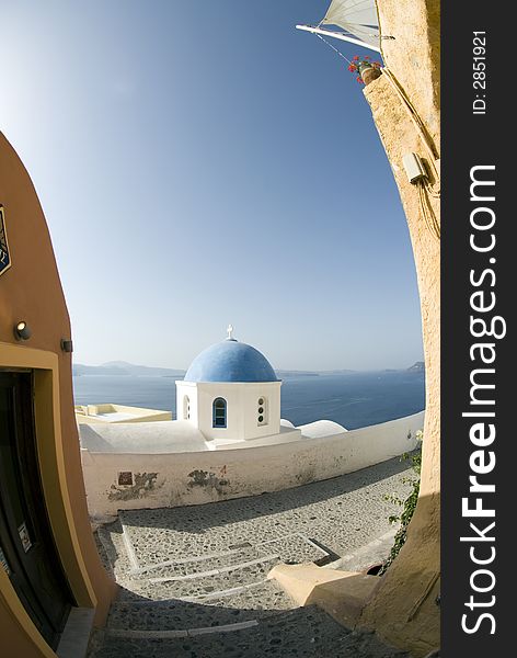 Greece greek island church  stone stairs fish-eye view santorini oia. Greece greek island church  stone stairs fish-eye view santorini oia