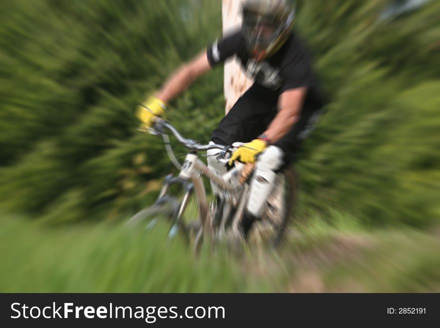 Mountain biker with zooming effect. Mountain biker with zooming effect