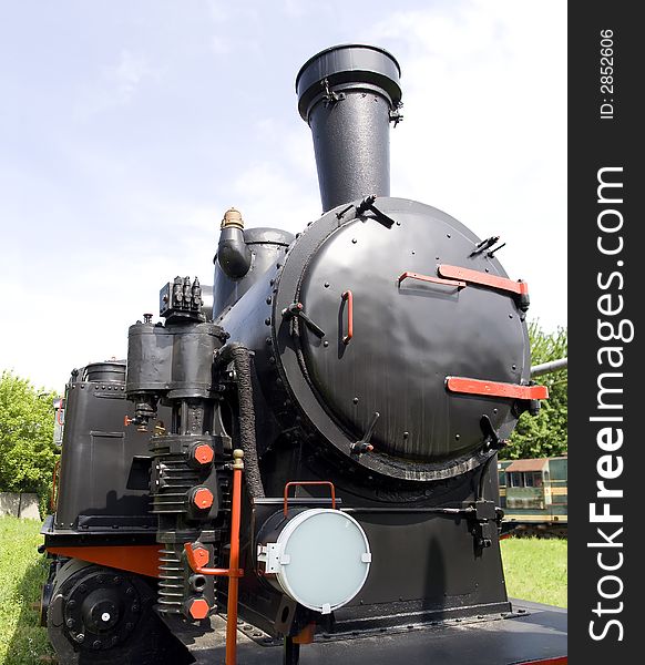 Front face of Old black steam train. Front face of Old black steam train