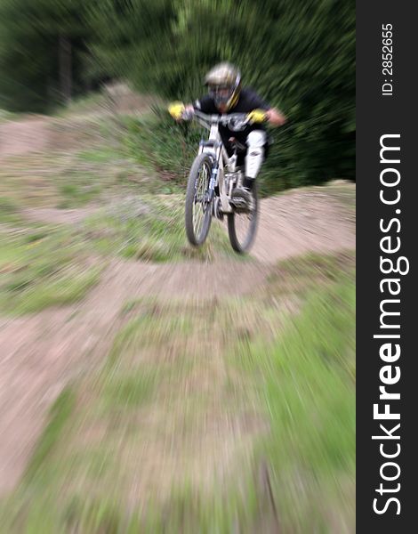 Mountain biker with zooming effect. Mountain biker with zooming effect