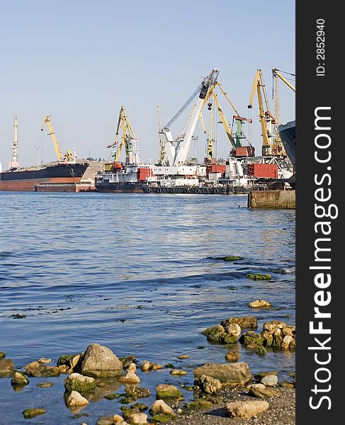 Seaport c stones at ocean in the foreground