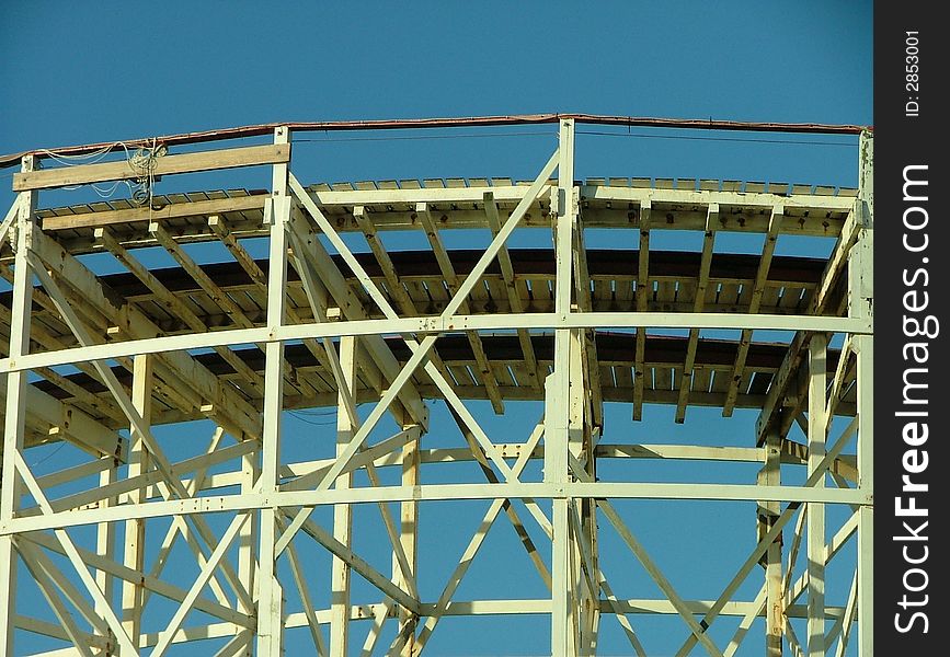 An old wooden rollercoaster by the seaside. An old wooden rollercoaster by the seaside