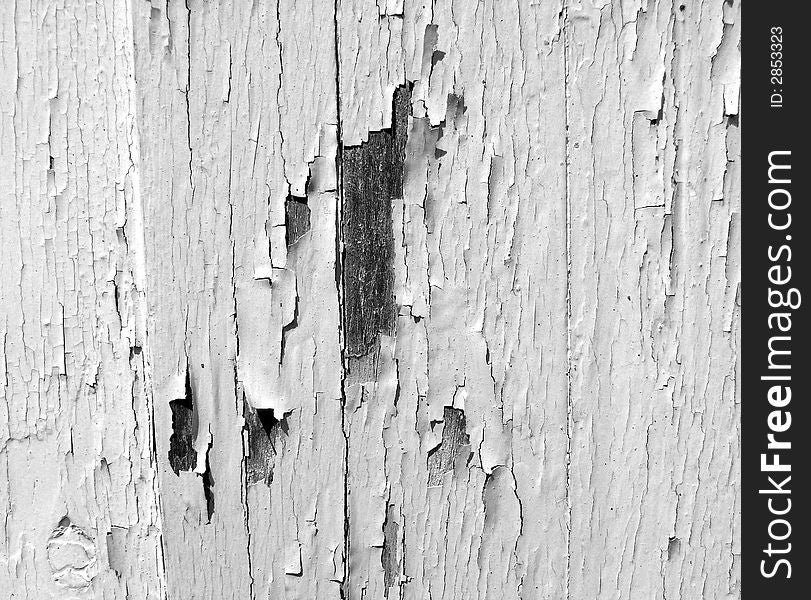 An image of some painted wood that is cracked,it would make an interesting texture background. An image of some painted wood that is cracked,it would make an interesting texture background.