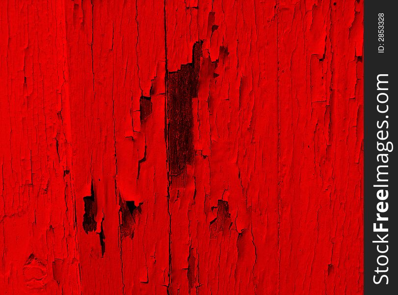 An image of some painted wood that is cracked,it would make an interesting texture background. An image of some painted wood that is cracked,it would make an interesting texture background.