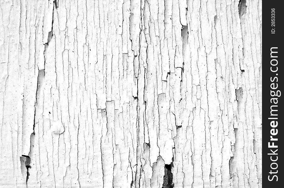 An image of some painted wood that is cracked,it would make an interesting texture background. An image of some painted wood that is cracked,it would make an interesting texture background.