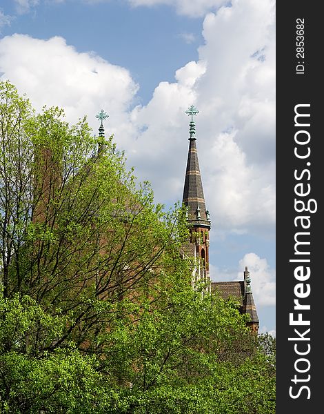 The steeples of a Catholic Church rising into the sky. The steeples of a Catholic Church rising into the sky.