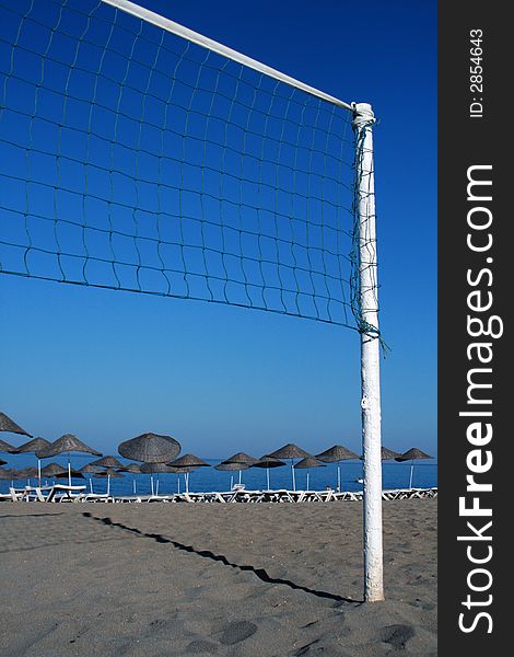 Volleyball net on the sand beach