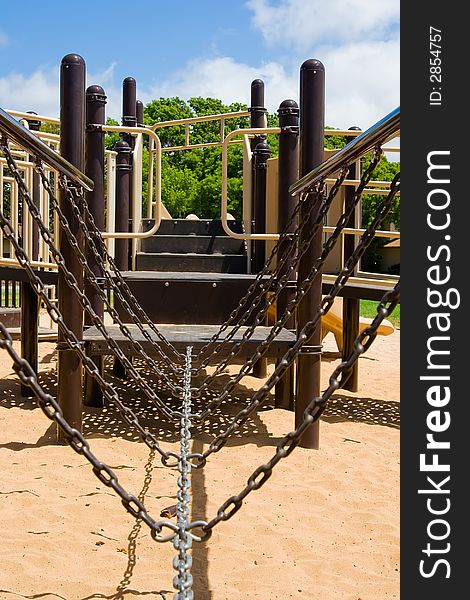 Playground chain bridge connecting two sides for children to cross