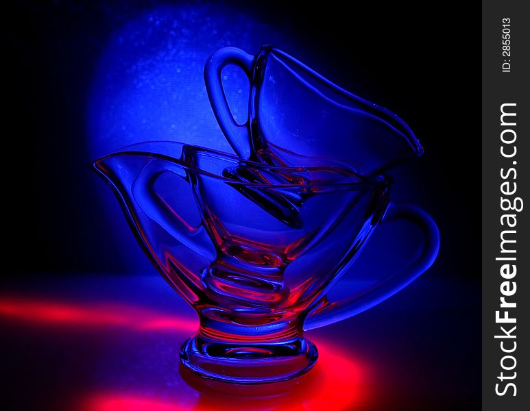 Fragile red-blue glass and reflections