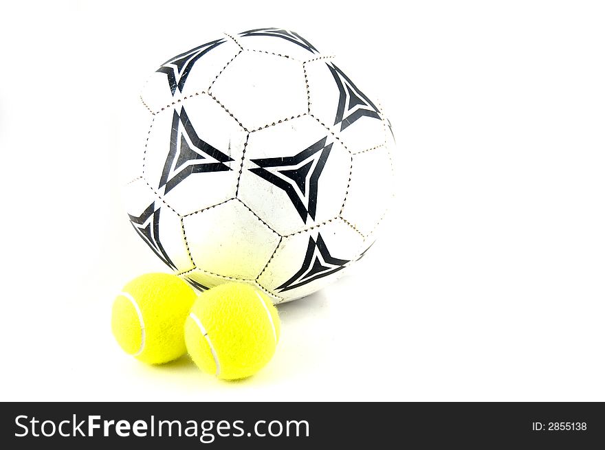 Soccer and tennis balls on a white background. Soccer and tennis balls on a white background