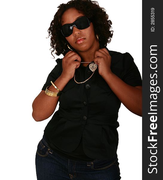 Isolated african american girl wearing sun glasses and urban type of necklace showing serious expression. Isolated african american girl wearing sun glasses and urban type of necklace showing serious expression