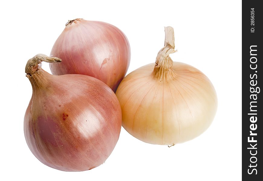 Three onions studio isolated on white