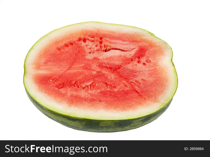 A ripe juicy watermelon cut in half. A ripe juicy watermelon cut in half.