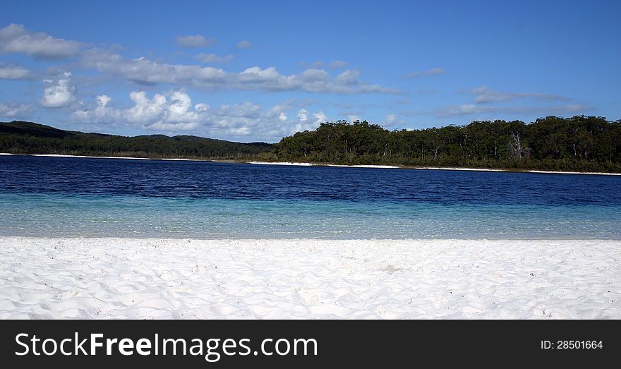 Inland Freshwater lake on Fraser Island, the worlds largest sand island, located off the southern Queensland coast in Australia. Inland Freshwater lake on Fraser Island, the worlds largest sand island, located off the southern Queensland coast in Australia.