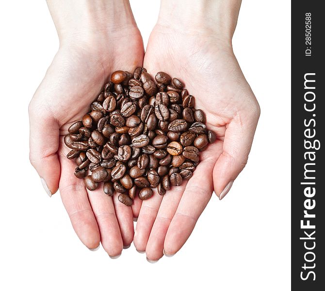 Cupped hands holding coffee beans. Cupped hands holding coffee beans