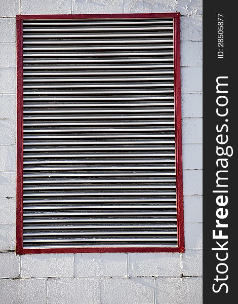 Large Industrial Vent On Cinder Block Wall