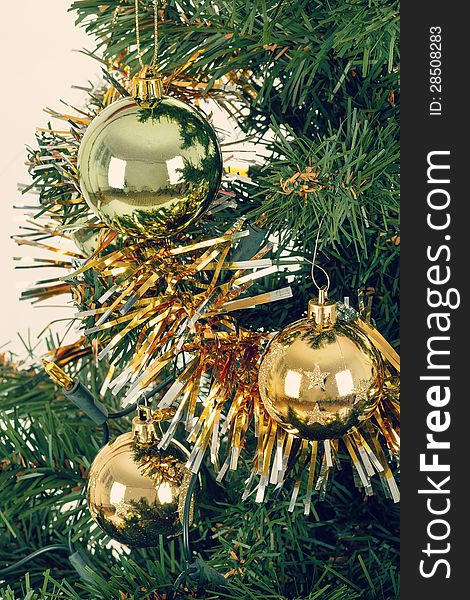 Decorated Christmas Tree With Yellow And Green Balls