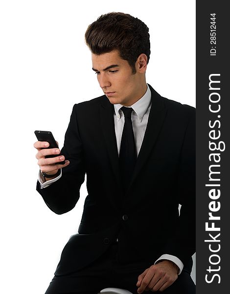 Portrait of a handsome businessman talking on the cellphone , isolated on white background. Portrait of a handsome businessman talking on the cellphone , isolated on white background