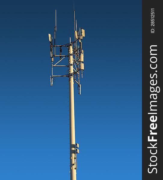 Communication antenna on a beautiful blue sky