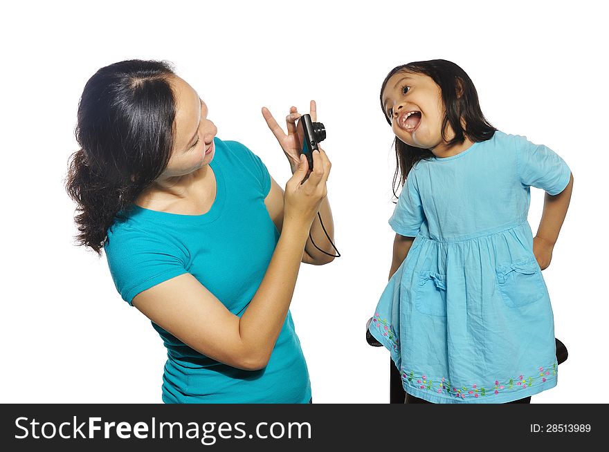 Mother and daughter taking own photography with camera