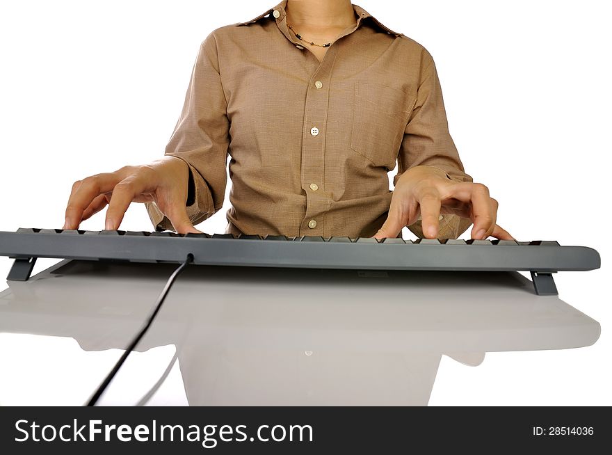 Woman hand typing on black computer keyboard over white background. Woman hand typing on black computer keyboard over white background