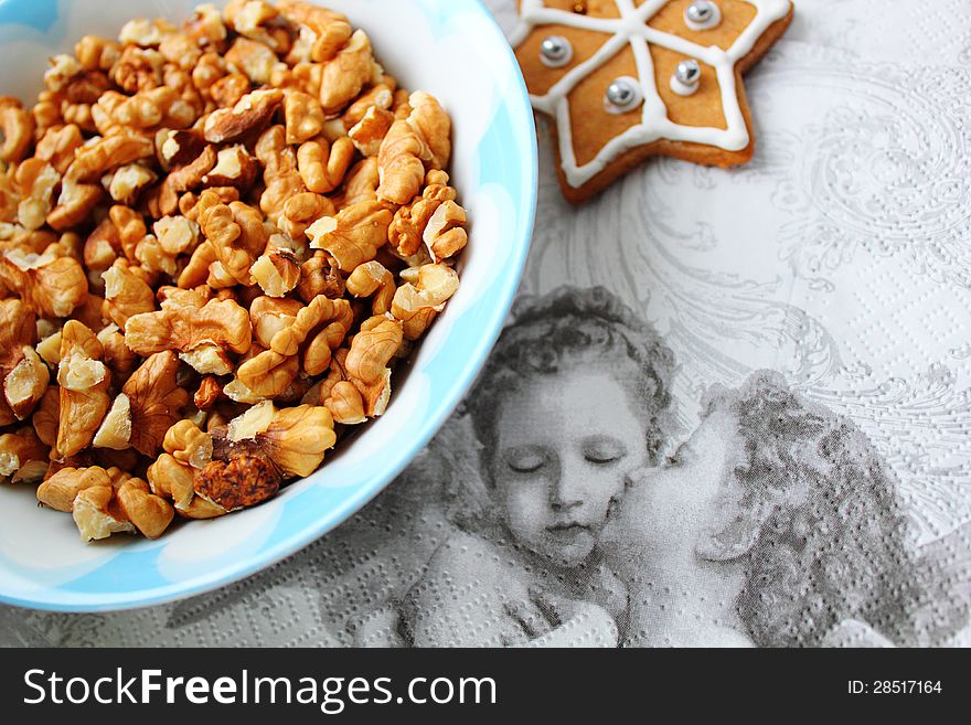 Christmas preparation background with angels and walnuts