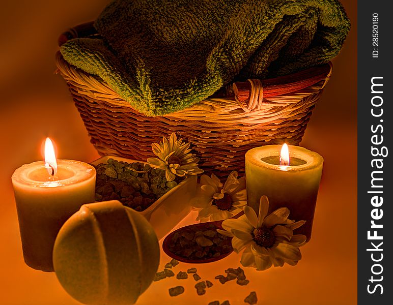 Sea salt, candles, flowers and towel in spa still life. Sea salt, candles, flowers and towel in spa still life