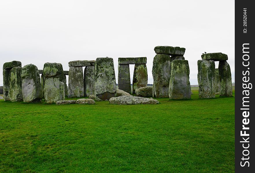Stonehenge is a prehistoric monument in the English county of Wiltshire. Stonehenge is the remains of a ring of standing stones set within earthworks. It is in the middle of the most dense complex of Neolithic and Bronze Age monuments in England.