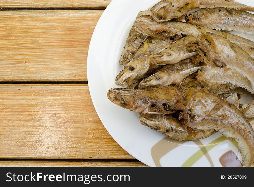 Fried fish on dish, delicious thai food