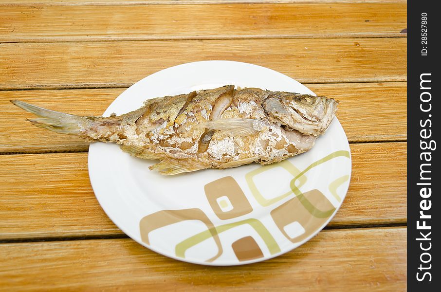 Fried Fish On  Wood Background