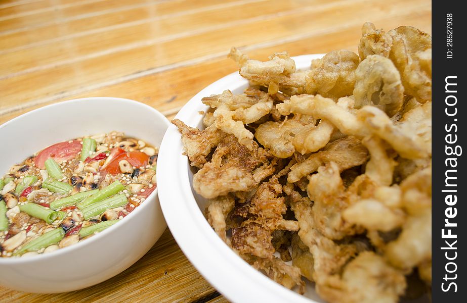 Fried mushroom with spicy sauce