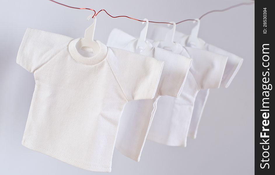 Dry white t-shirts with coat hanger