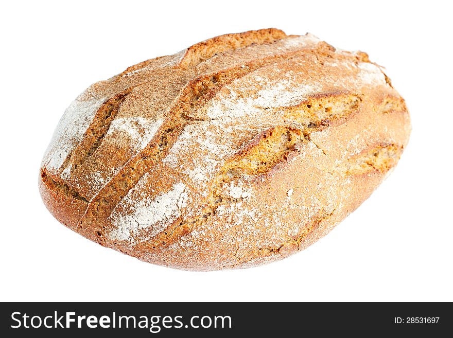 Fresh whole country bread , isolated on white